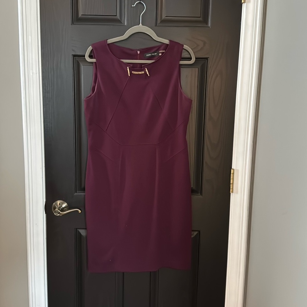 Ivanka Trump maroon sleeveless dress